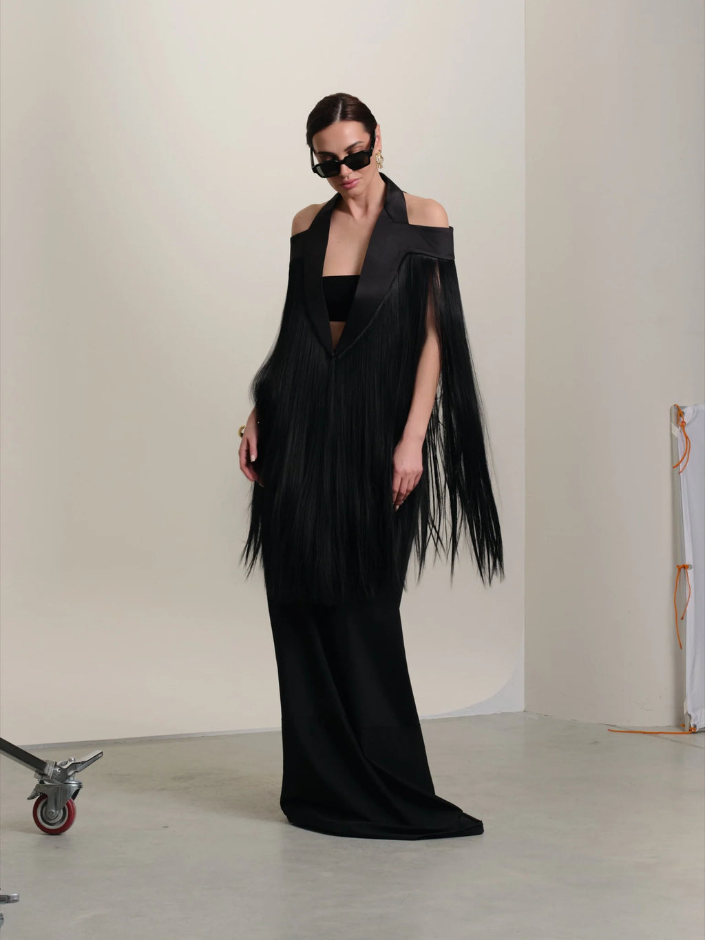 Women's black floor-length fringed cape