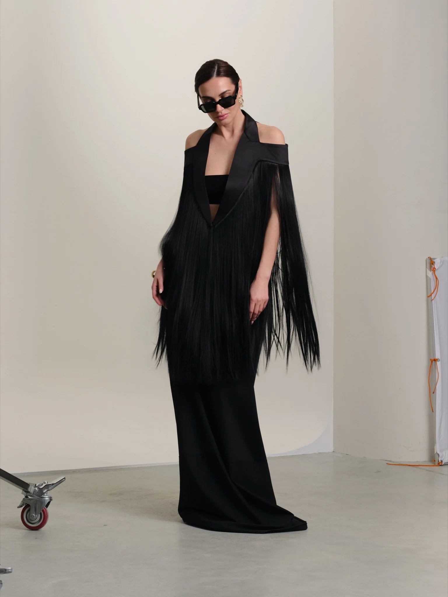 Women's black floor-length fringed cape