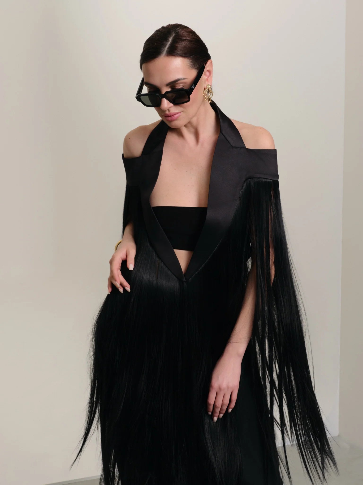 Women's black floor-length fringed cape